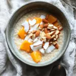 Quinoa Porridge with Persimmon, Almonds + Coconut