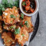 Onion and feta fritters with sweet chilli soy dipping sauce