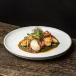 Monkfish ‘char siu’ with jamón Iberico, smoked mushrooms and agretti