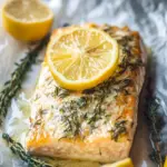 Savory Garlic Butter Baked Salmon – Quick, Healthy & Delicious 6 https://www.alyonascooking.com/wp-content/uploads/2022/11/baked-salmon-with-mayo-12-768x1152.jpg
